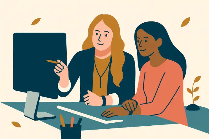 Group of women working together on financial education materials.